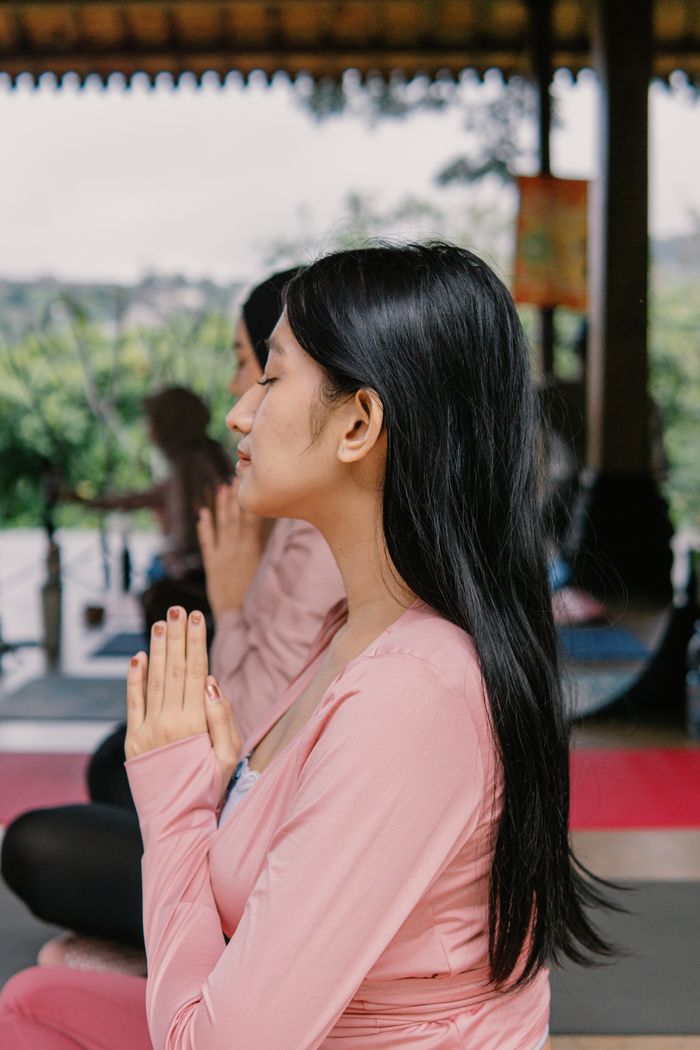 services-03 Serene yoga session outdoors in Jawa Barat, Indonesia, showcasing mindfulness and serenity.